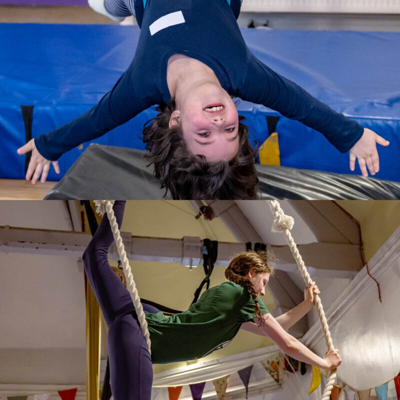 A young boy grins as he hangs upside down above a mat. A girl does the spilts as she hangs between two thick ropes. They are taking part in the circus workshops at Gosforth Civic Theatre.