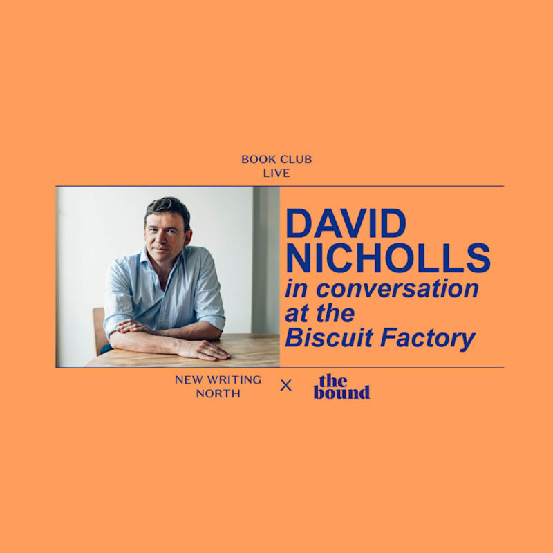 An orange background is overlaid by a photo of author David Nicchols, who sits at a wooden table wearing a blue shirt. Next to him is some deep purple text, which says: David Nicchols in conversation at The Biscuit Factory.