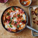 Ottolenghi's sweet potato shakshuka with sriracha butter and pickled onions