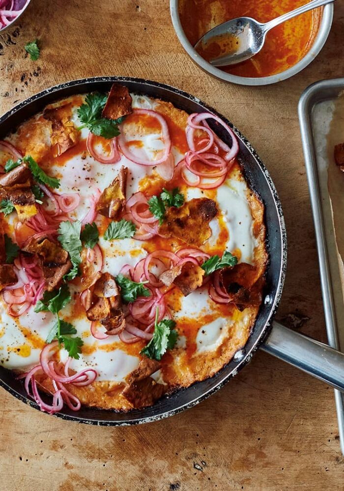 Ottolenghi's sweet potato shakshuka with sriracha butter and pickled onions