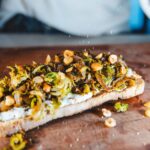 Sticky onions, sprouts and chestnuts on toast