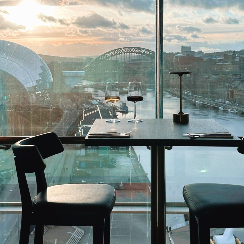 A table for two at the SIX rooftop is overlooking Newcastle's famous bridge as the sun starts to set.