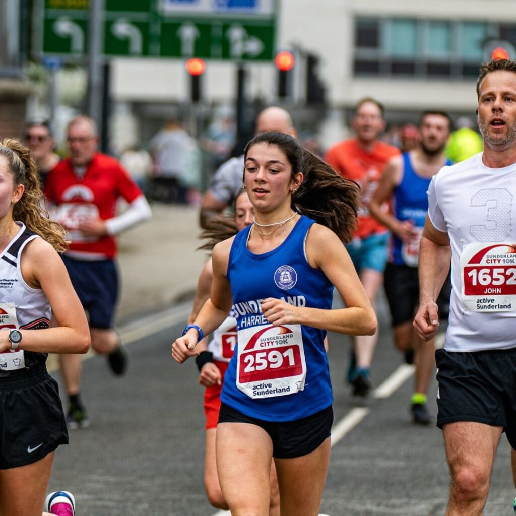 Runners smile as they take part in the Sunderland 10k run.