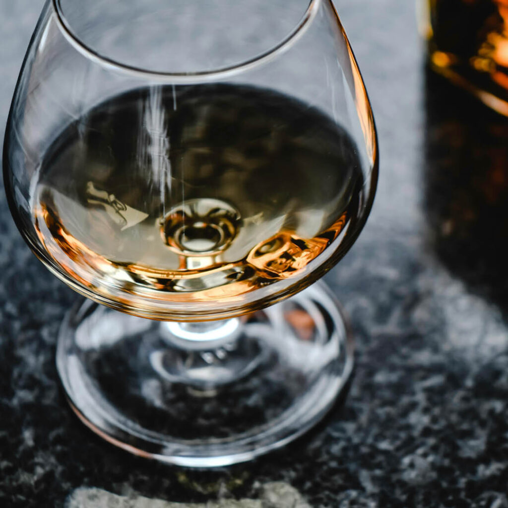 Golden whisky in a glass.